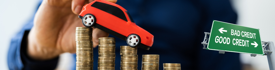 toy car driving down a pile of coins symbolizing better price with good credit 